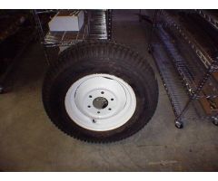 Front turf tire and rim for 354